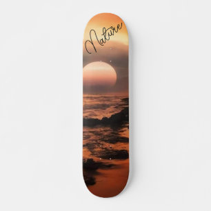 patineta con la puesta del mar