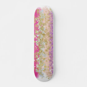 Patineta con manchas doradas rosa y púrpura