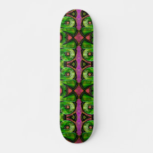 Patineta de graffiti rosa y verde