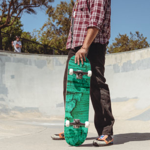 Patineta de madera verde jade.
