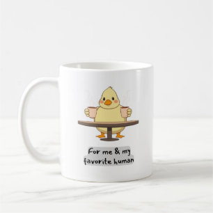 Pato con dos tazas de café