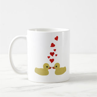 Patos en taza del amor