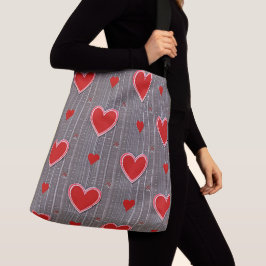 Patrón con bolsas de compras de corazones rojos