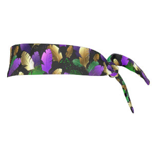 Patrón continuo con plumas de Mardi Gras