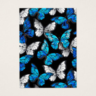 Patrón continuo oscuro con mariposas azules Morpho