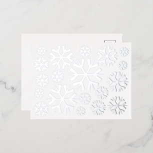 Patrón de copos de nieve blancos en la tarjeta pos