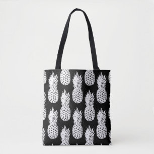 Patrón de frutos de piña negra y blanca en bolsas
