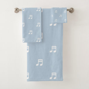 Patrón de notas musicales blancas sobre azul claro