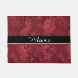 Patrón de plumas rojas de la alfombra de bienvenid