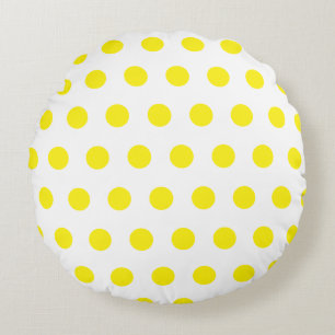 Patrón de puntos de polka amarillos sobre almohada