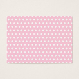 Patrón de puntos de polka rosa y blanco.