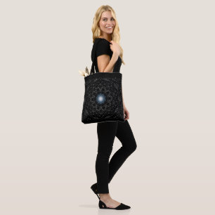 Patrón estelar de Kaleidoscope sobre bolsas negras