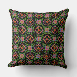 Patrón floral de Rangoli sobre almohada negra o co