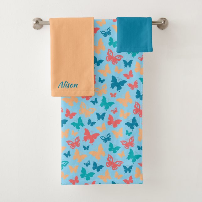 Patrón mariposa simple color beige rosa azul turqu (In situ)