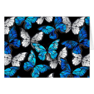 Patrón oscuro sin costuras con mariposas azules Mo