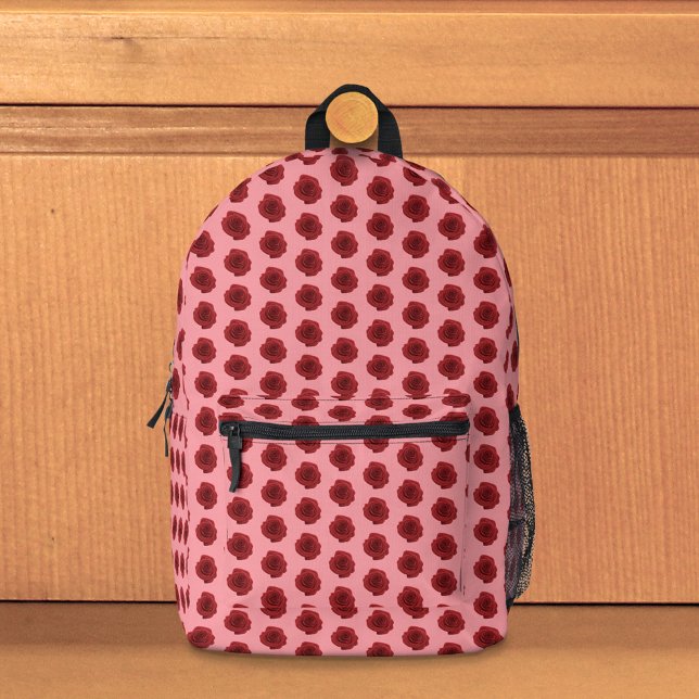 Patrón sin foco de la flor rosa roja en la mochila (Seamless pattern of red Rose flower on backpack)