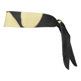 Paw dorada de perro brillante sobre fondo negro