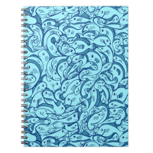 Peces azules en la cuaderno de espiral marina