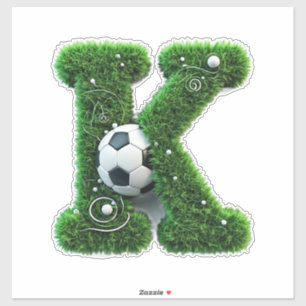 Pegatina Carta K de césped verde con balón de fútbol