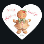 Pegatina Chica de Little Gingerbread<br><div class="desc">Pan de jengibre y Navidades van juntos. ¿Qué podría ser más lindo que un pequeño chica de pan de jengibre con una sonrisa grande y brillante y arcos festivos? ¡No es mucho más dulce que esto! Esta persona linda es de una acuarela vintage. "Feliz Navidad" es el saludo, junto con...</div>