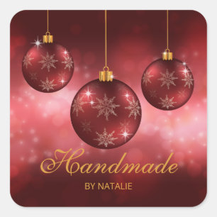 Pegatina Cuadrada Adornos Navideños Festivos Rojos Sobre Bokeh Rojo