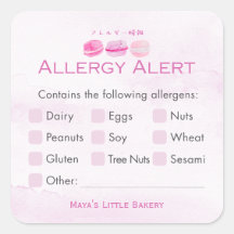 Alerta de alergia en panadería de macarones rosado