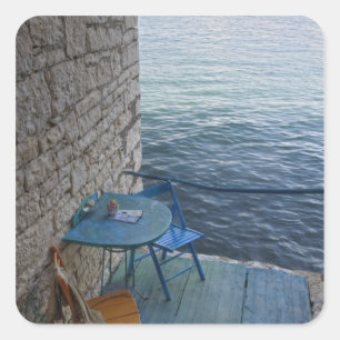 Pegatina Cuadrada Asientos a orillas del mar para dos personas en la