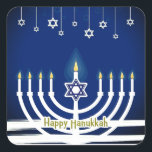 Pegatina Cuadrada Blue Happy Hanukkah Star Menorah Candle Lights<br><div class="desc">Celebra el Festival de las Luces con estilo con estos encantadores pegatinas Happy Hanukkah. Este diseño festivo presenta una menorah blanca iluminada con velas en un fondo azul con Happy Hanukkah escrito en el fondo en oro. La pequeña decoración Magen David o Star of David cuelgan de la parte superior...</div>