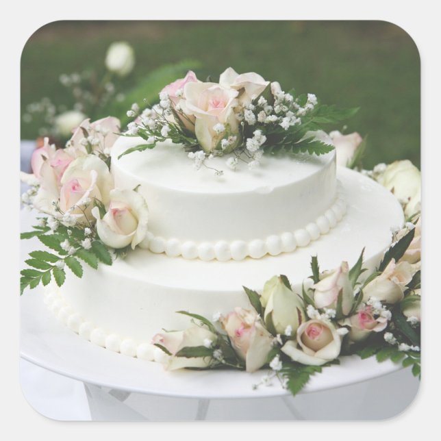 Pegatina Cuadrada Boda Cake (A beautifully decorated wedding cake adorned with delicate roses and greenery.  )