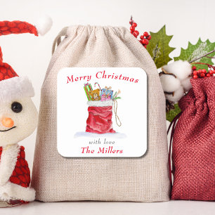 Pegatina Cuadrada Bolsa de regalos de Papá Noel al agua Navidad