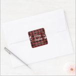 Pegatina Cuadrada Bufalo Check Holly Merry Christmas Return Address<br><div class="desc">Esta etiqueta de la dirección de retorno de vacaciones muestra el mensaje "Feliz Navidad" en un tipo de cepillo blanco, flanqueado por hojas y bayas huecas, en un fondo de protección de búfalo rojo. Personalizar con el nombre de su familia arriba y la dirección abajo. Consulte nuestras colecciones para ver...</div>