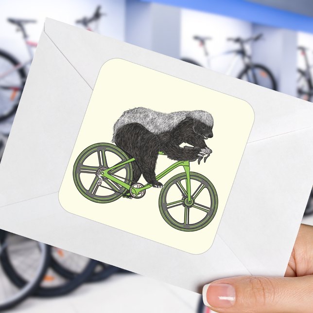 Pegatina Cuadrada Ciclismo de Honey Badger Funny Badass (Honey badger on a bicycle sticker funny cycling wild animal badass cyclist)