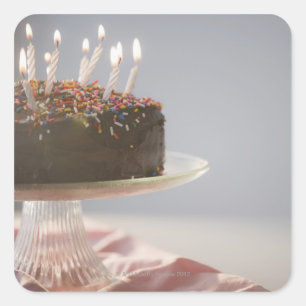 Pegatina Cuadrada Cierra la tarta de cumpleaños de chocolate con vel