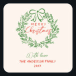 Pegatina Cuadrada Cinta de la banda roja retro Wreath Merry Christma<br><div class="desc">Si buscas una pegatina única y hermosa fácil de editar para Navidad festiva. Este es perfecto para ti. Y como ven el diseño presenta una ira de cinta pintada a mano y pintada de color verde. Con una caligrafía escrita a mano roja de MERRY CHRISTMAS. Y tu apellido y año...</div>