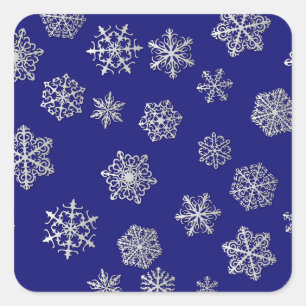 Pegatina Cuadrada Copo de nieve plateados sobre un fondo azul oscuro