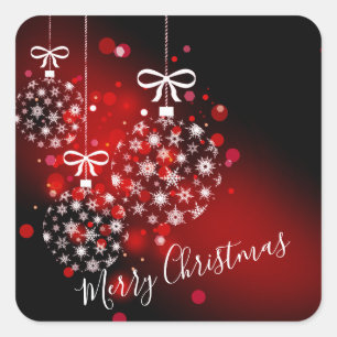 Pegatina Cuadrada Copos de nieve en un fondo rojo y negro.