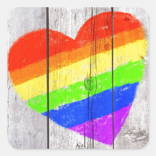 Pegatina Cuadrada Corazón del arco iris en un panel de madera sucio