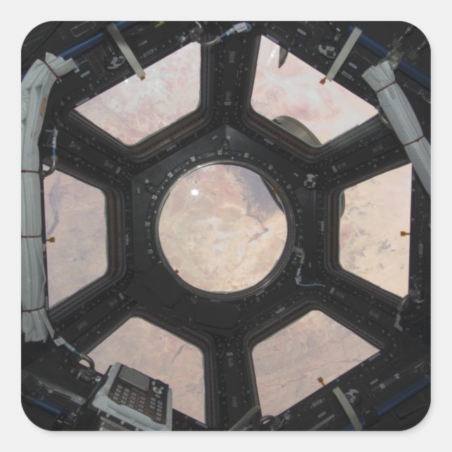 Pegatina Cuadrada El desierto del Sahara visible a través de las ven (Anverso)