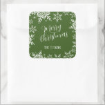 Pegatina Cuadrada Elegantes copos de nieve Dark Green Merry Christma<br><div class="desc">Este pegatina presenta un diseño sobrio y elegante de copos de nieve sobre un fondo verde oscuro del bosque. En nuestra tienda, zazzle.com/store/doodlelulu, encontrará opciones de color adicionales, así como la colección de productos de coordinación. Contáctenos si necesita este diseño aplicado a un producto específico para crear su propio elemento...</div>