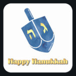 Pegatina Cuadrada Feliz Hanukkah Dreidel<br><div class="desc">Gold Happy Hanukkah texto con un dreidel azul.</div>