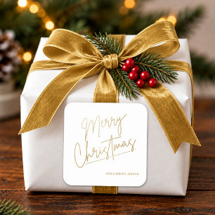 Pegatina Cuadrada Feliz Navidad en oro sobre blanco