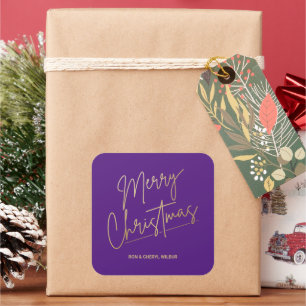 Pegatina Cuadrada Feliz Navidad en oro sobre morado