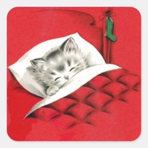 Pegatina Cuadrada Gato en la cama en Navidades