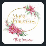 Pegatina Cuadrada Gold Merry Christmas Text con Poinsettias y Pine<br><div class="desc">Rocios de elegantes poinsettias y bayas a la acuarela con pino de invierno y vegetación con banda de gradiente dorado ovalada y fuente personalizado "Feliz Navidad" con chispas doradas y campo de texto editable.</div>