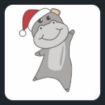 Pegatina Cuadrada Hippo Merry Christmas Winter Animals Hippos<br><div class="desc">The hippo to softness with fair lights. Funny animals with gifts and snow to the holidays. Also funny for Christmas in July. Hippos are sweet animals and perfect for Christmas.</div>
