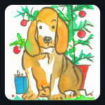Pegatina Cuadrada Hound Dog Merry Christmas<br><div class="desc">Una pegatina navideña que muestra a un perro enredado sentado junto a un simple árbol de Navidad con un regalo azul dibujado con tinta y pintado con acuarela en colores festivos.</div>