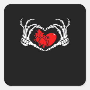 Pegatina Cuadrada Manos de Skeleton atemorizantes y corazón rojo esp