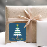 Pegatina Cuadrada Merry Chrismukkah Cute Hanukkah Christmas Tree<br><div class="desc">Este lindo pegatina de Merry Chrismukkah presenta un árbol de Navidad verde decorado con adornos de dreidel azul y una estrella judía de David dorada en la cima para Hanukkah para combinar las dos vacaciones para una familia que celebra ambos.</div>