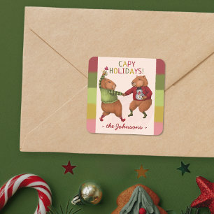 Pegatina Cuadrada Navidades del capibara disfrutan con su nombre fam