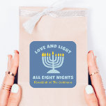 Pegatina Cuadrada Ocho noches judías de "amor y luz" en Hanukkah<br><div class="desc">¡Compartan la alegría de Hanukkah con estos pegatinas de "Amor y Luz durante las ocho noches"! Con un fondo azul sereno, un brillante ilustracion menorah y un texto de personalizable con el nombre de la familia, son ideales para las reuniones de Hanukkah, y aportan calidez y significado al Festival de...</div>